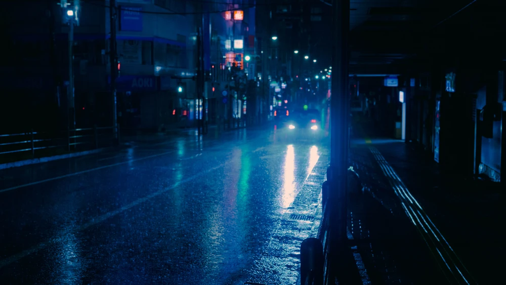 A car in the rainy night on the streets of Shinagawa, Tokyo, Japan